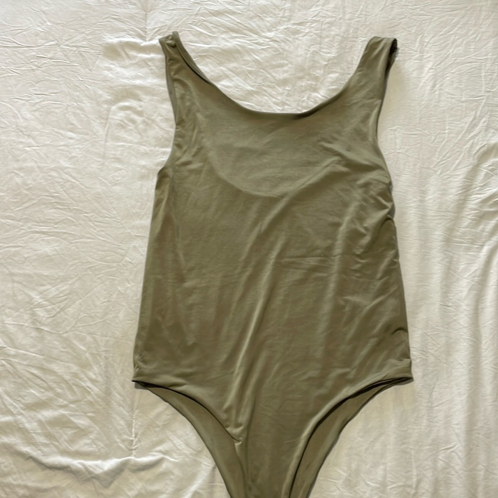 Green bodysuit, NWT, size xs